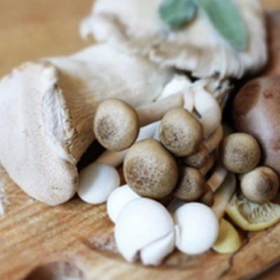 Mushrooms on a wooden plate